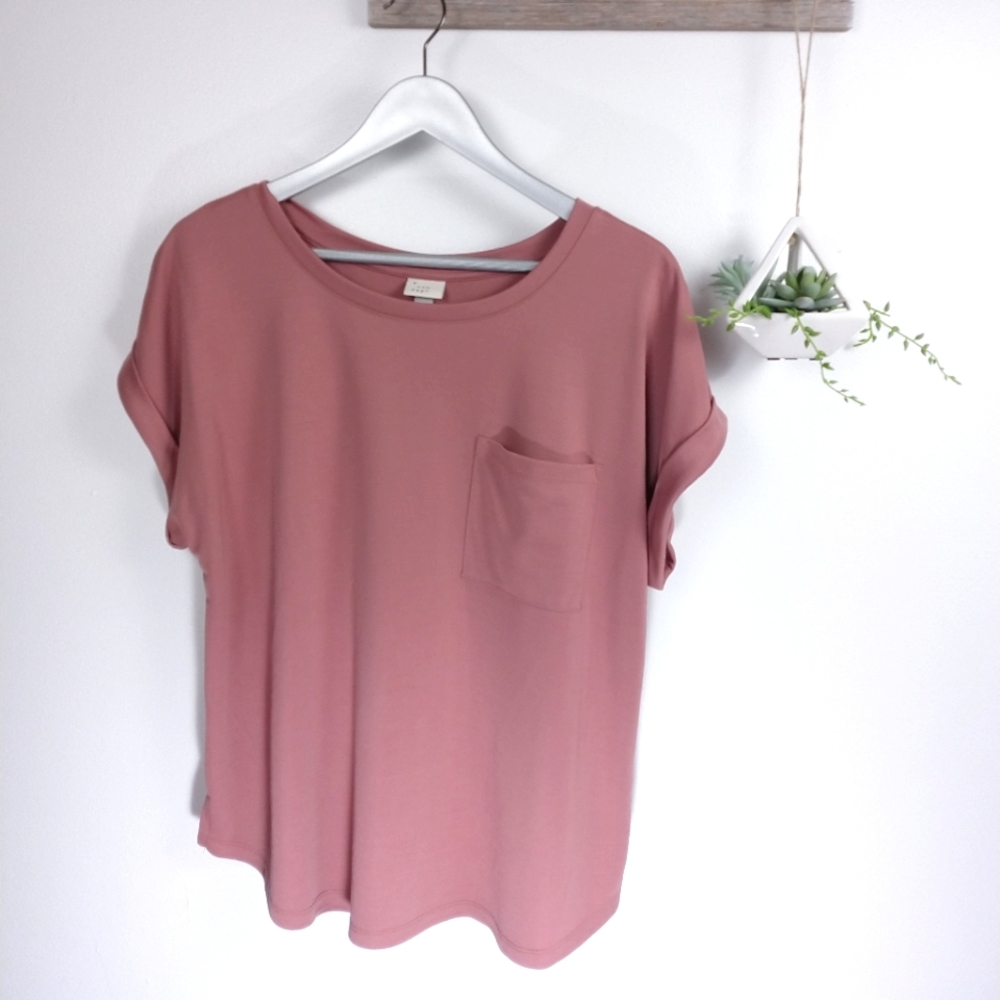 Cuffed blouse in a deep blush color